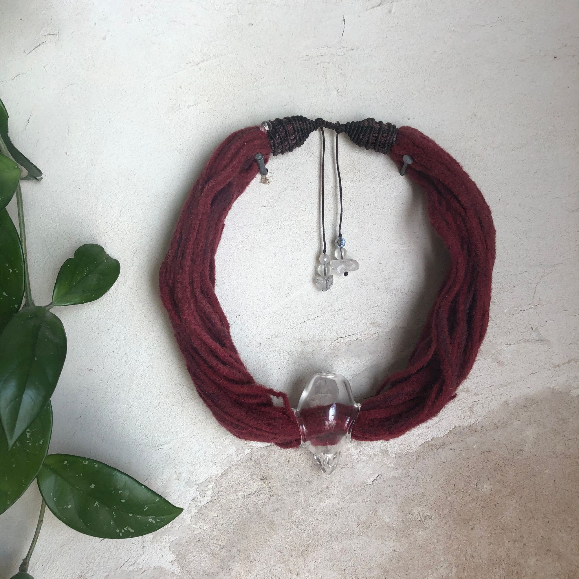  many stranded felt sculptural red fiber art necklace with Handblown Glass Raptor skull