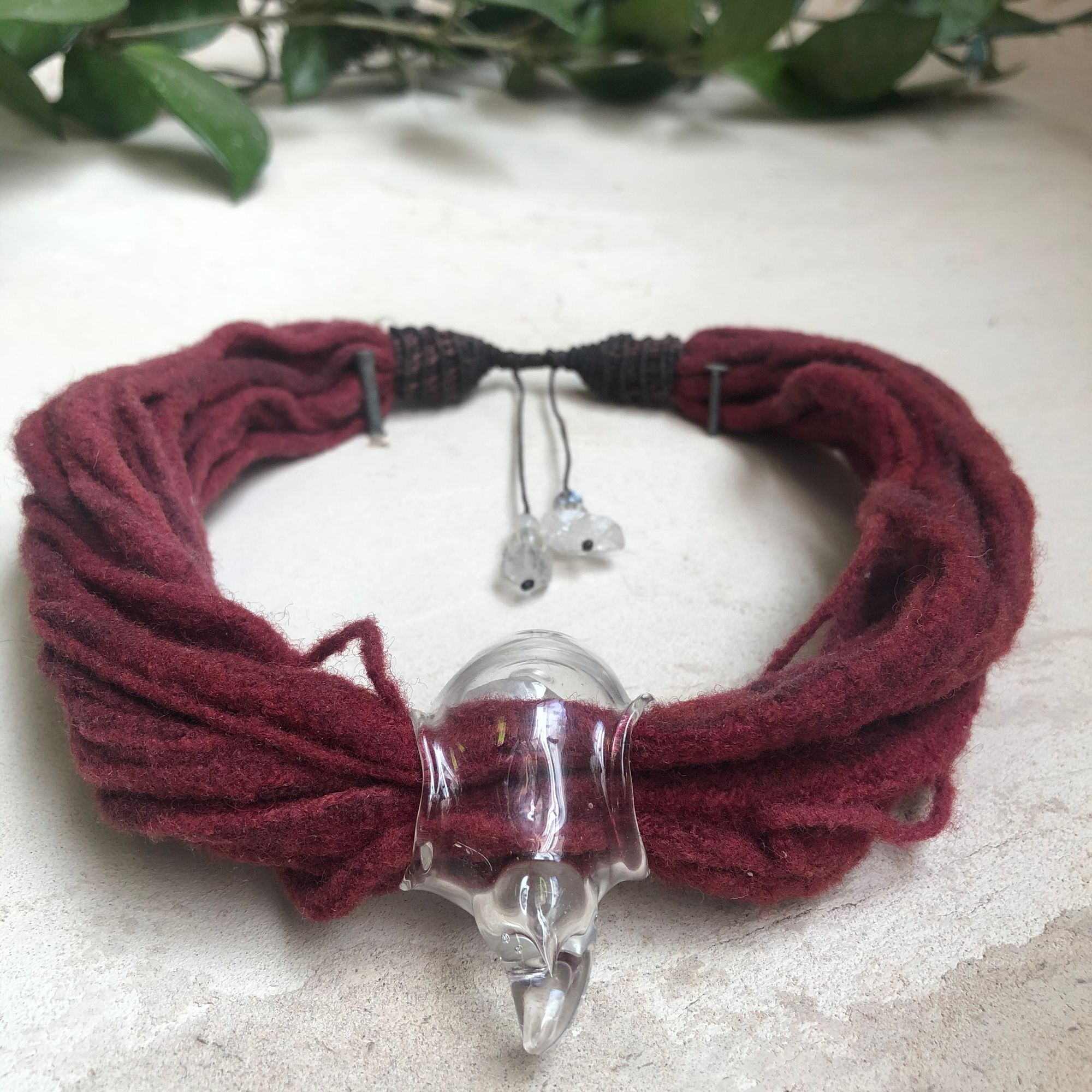  many stranded felt sculptural red fiber art necklace with Handblown Glass Raptor skull