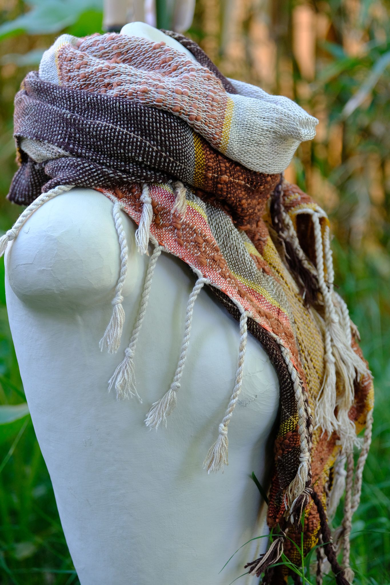 Chunky Cotton & Linen Handwoven Etherial Scarf in brown, blue, yellow and orange on a white mannequin