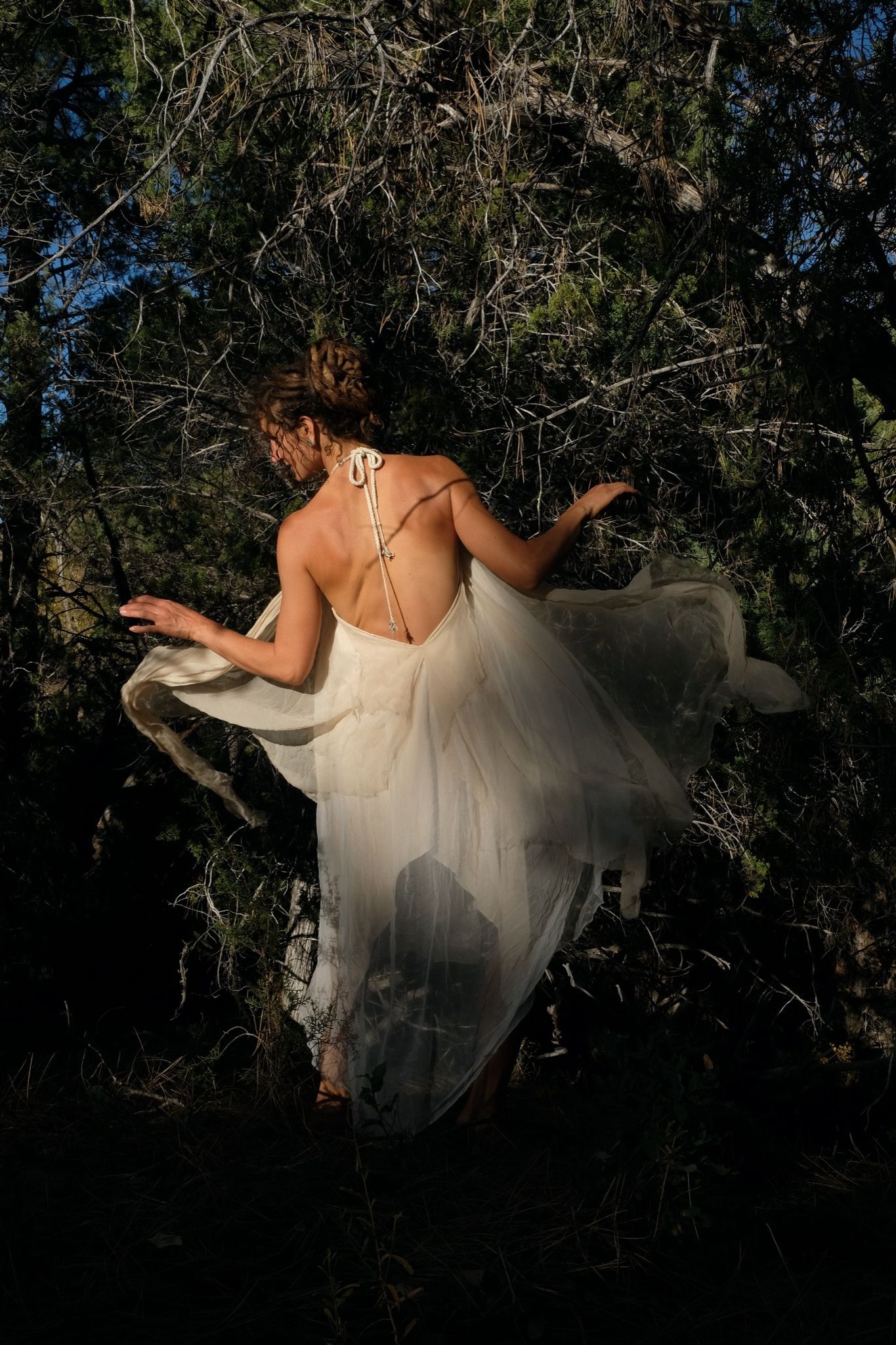 woman wearing white layered silk handmade dress