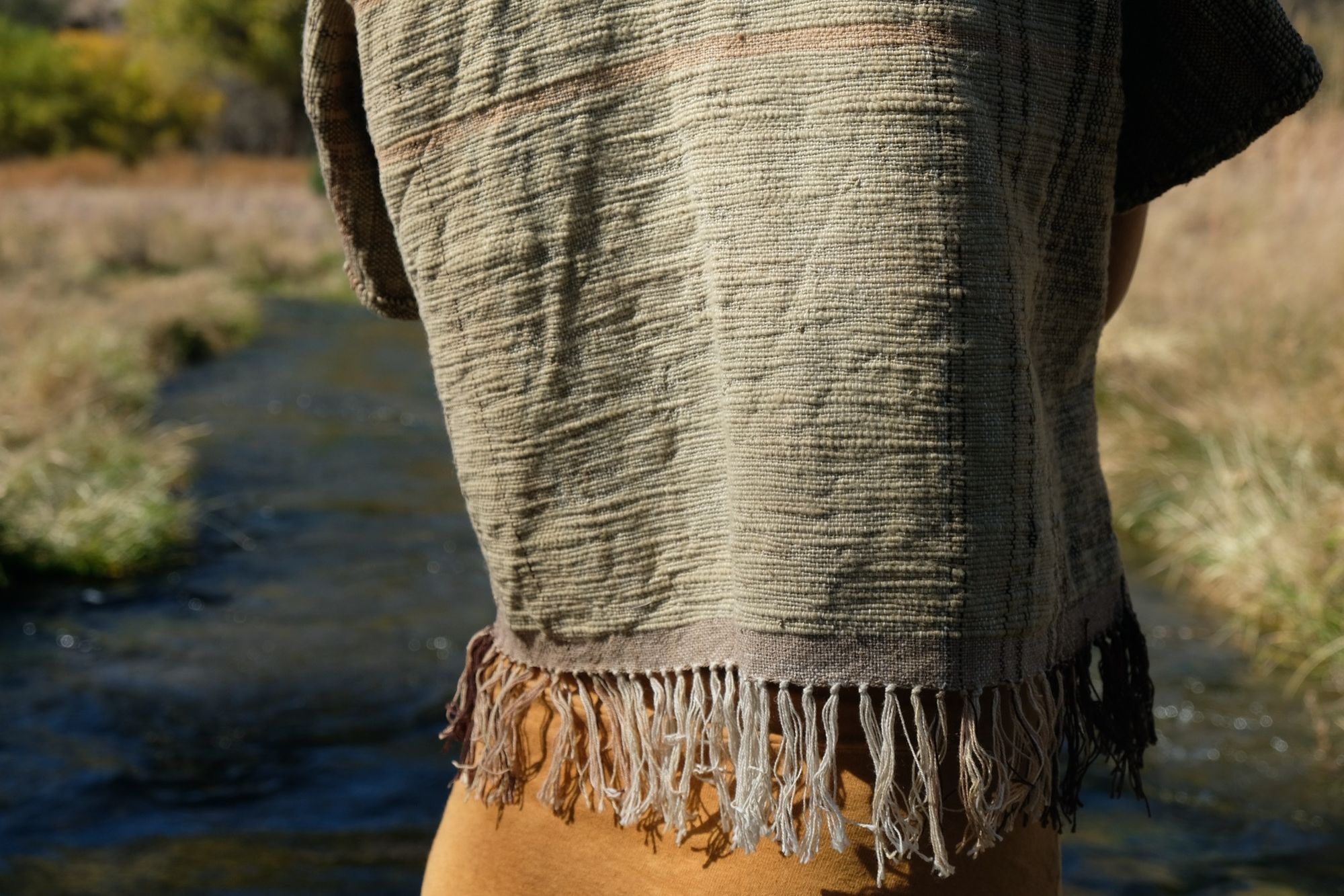 detail of woman wearing tan and dark brown Handspun handwoven Colorgrown Cotton Box Top