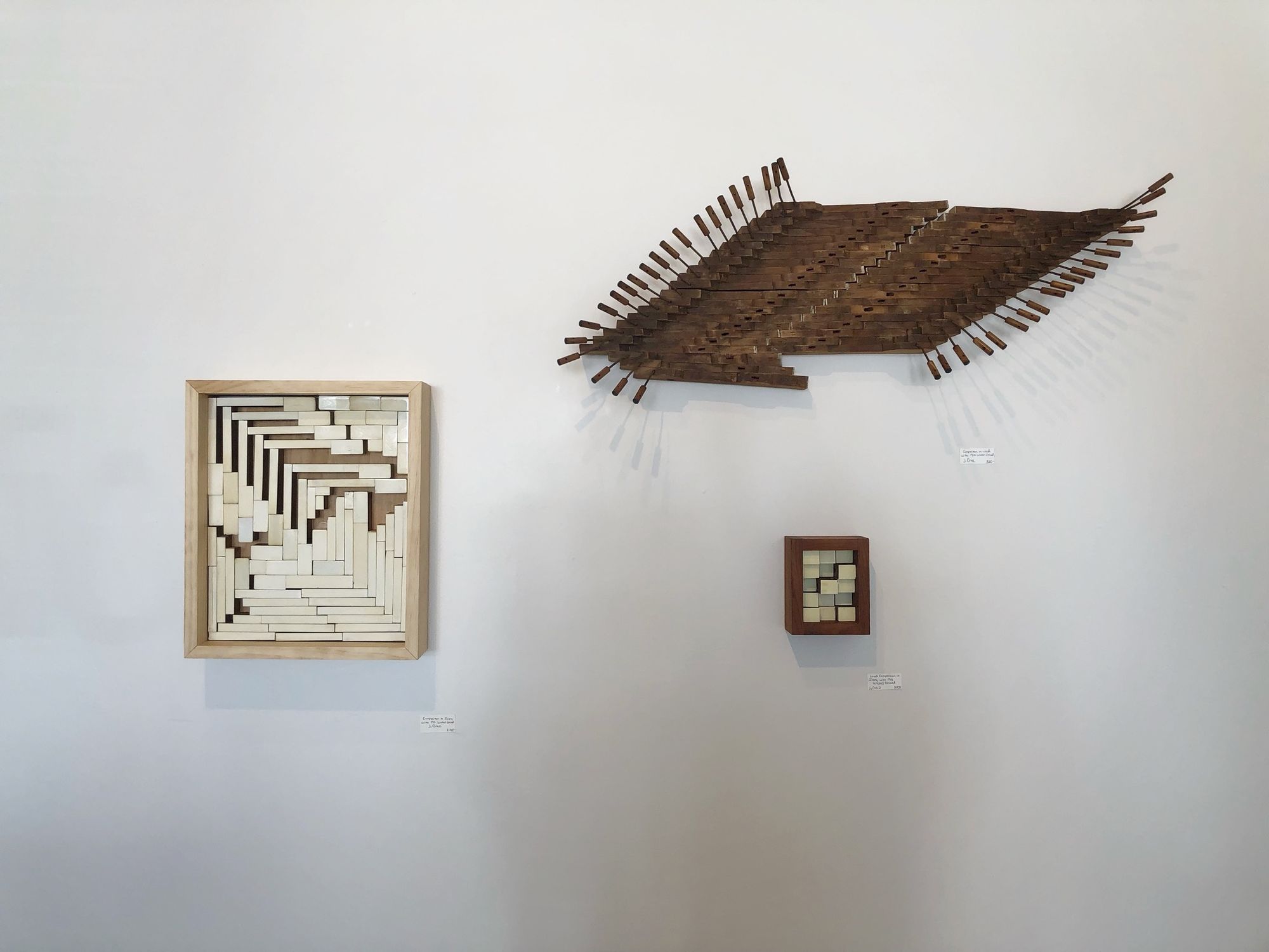 Three Wall mounted abstract sculptures made from Ivory piano keys and interior pieces