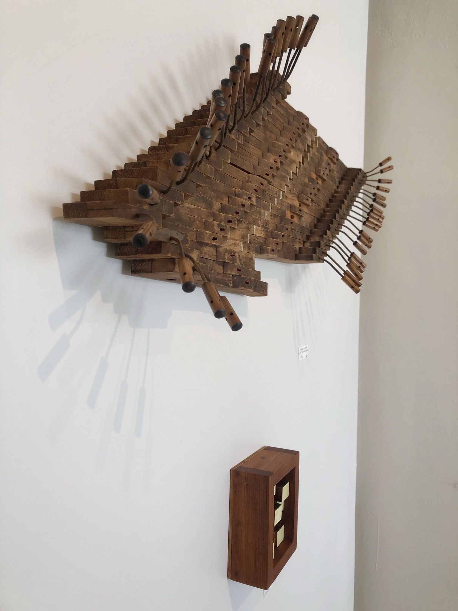 Wall mounted sculptures with Ivory keys and internal pieces from a 1910 Waters Grand piano 