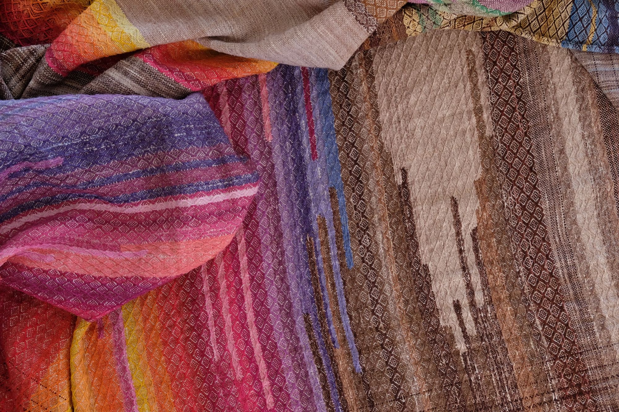 Handwoven, highly textures Diamond pattern fabric in every color of the rainbow, with natural browns and tans