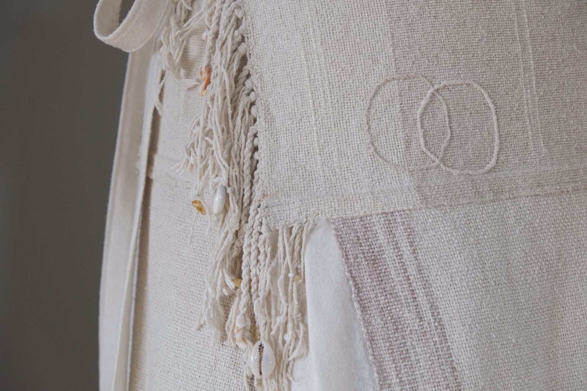 detail of handwoven highly textured wedding skirt