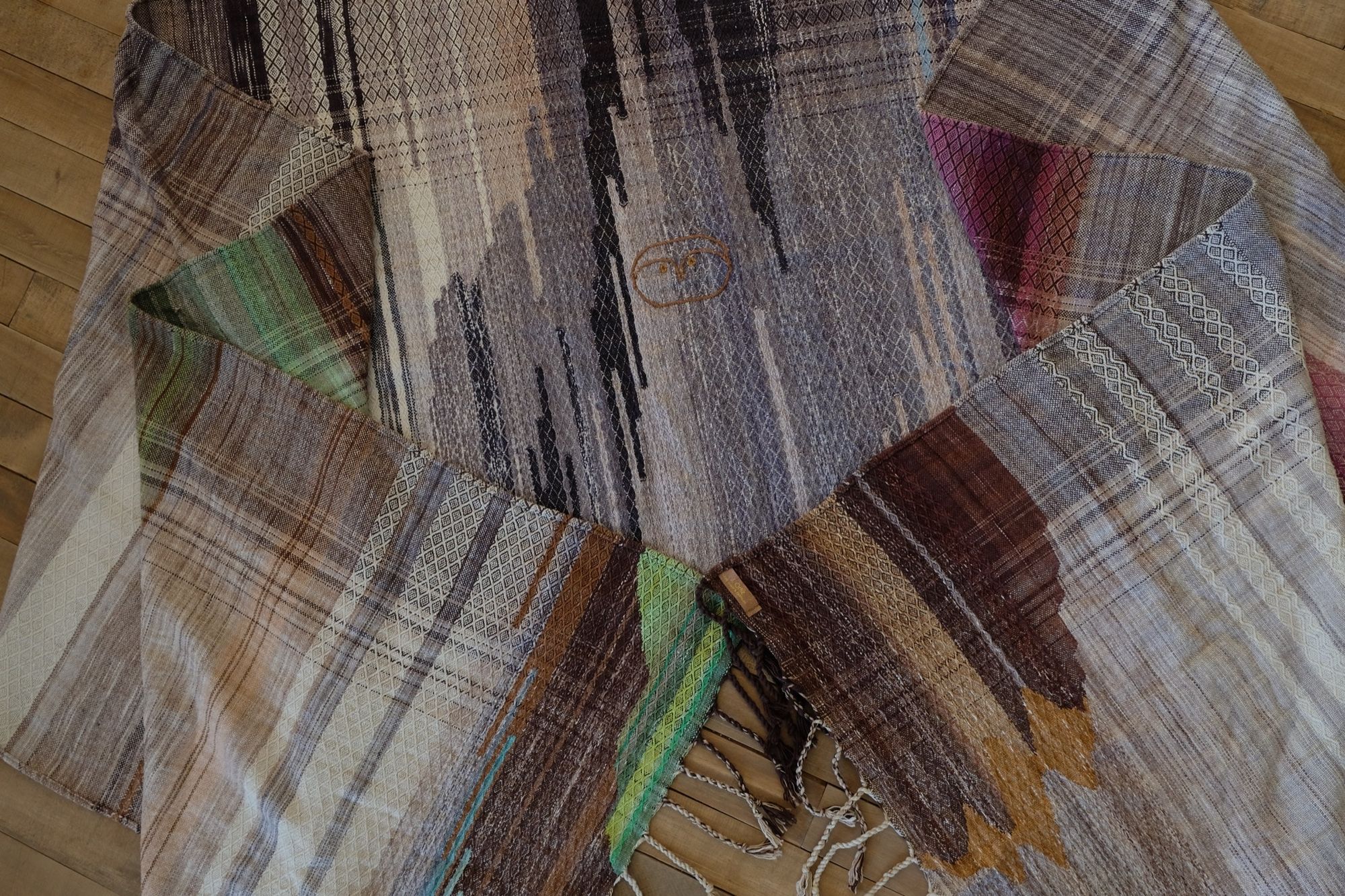 Detail of handwoven highly textured diamond pattern raw silk fabric
