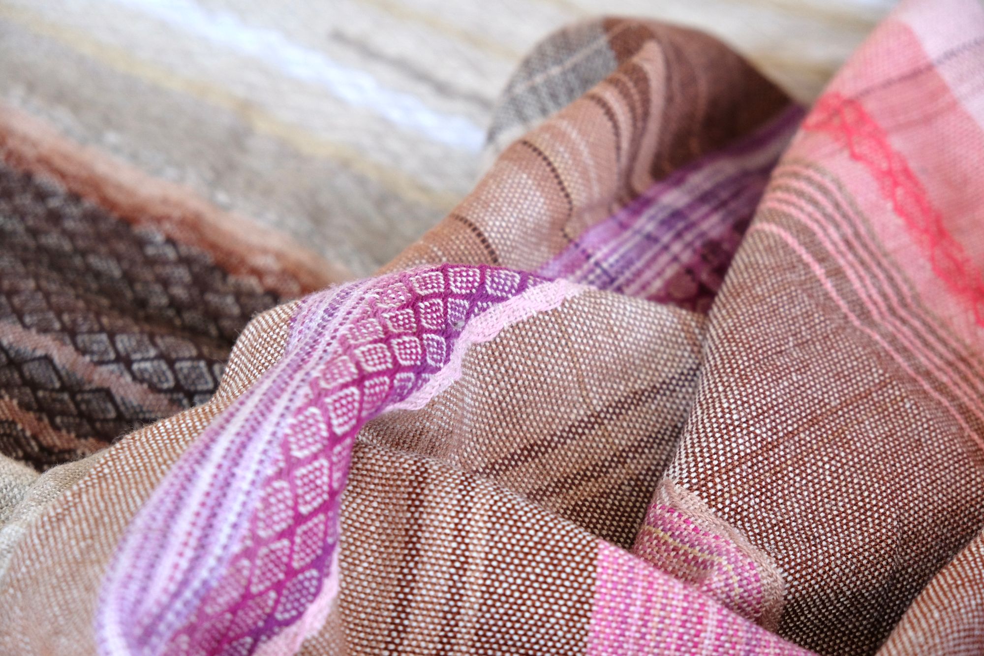 5 m of head oven rainbow colored fabric layers on a wooden floor