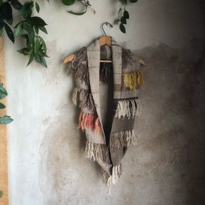 Grey and white handwoven cashmere scarf with naturally dyed salmon, brown and yellow fringe