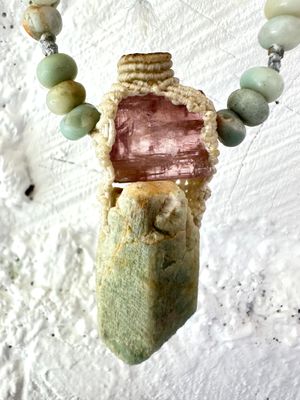 Detail of A luminous, pink tourmaline, soft turquoise amazonite stone And knotwork Basket necklace